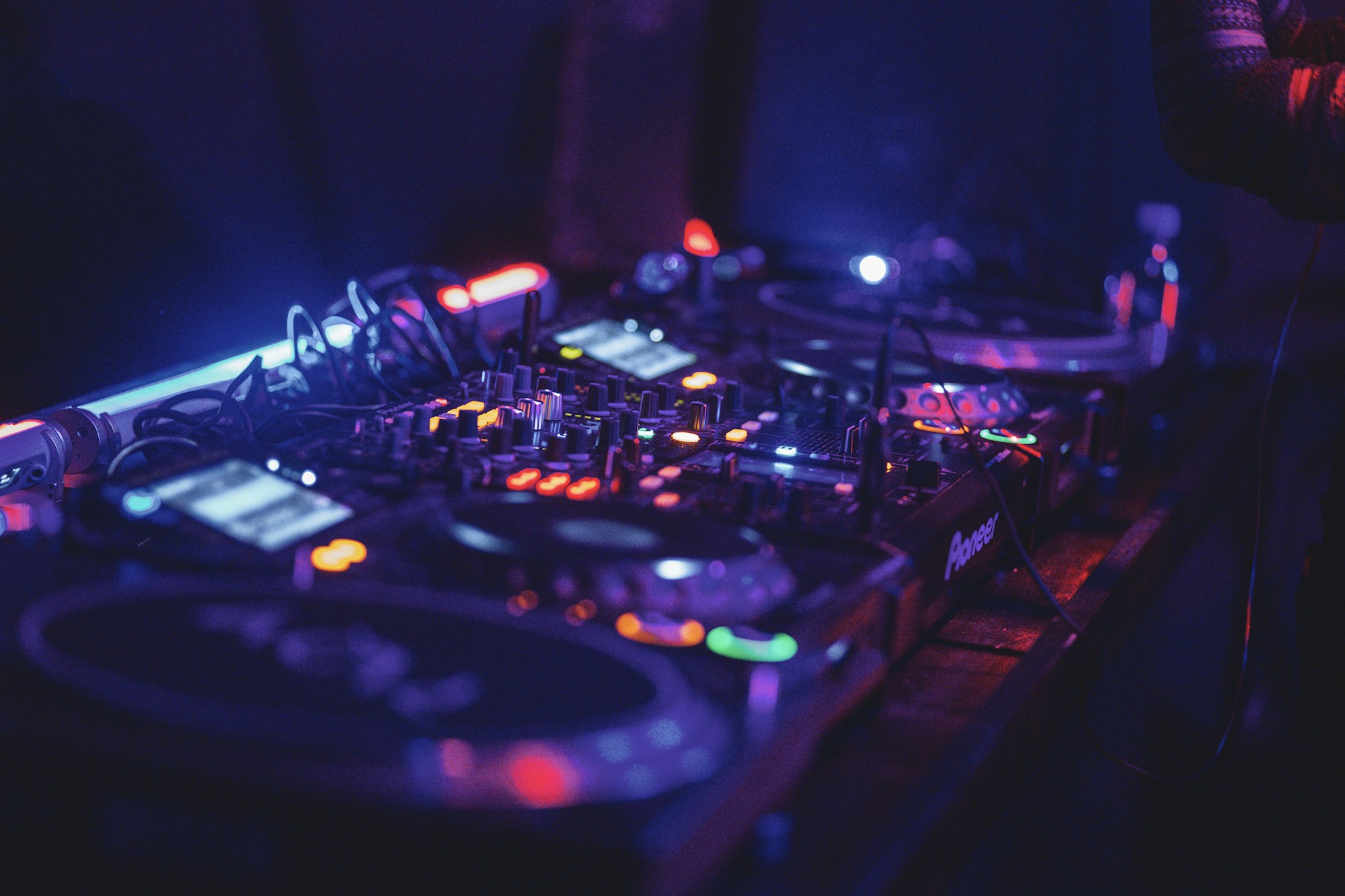 Illuminated DJ mixing desk, evoking the Street Parade's nine electronic stages