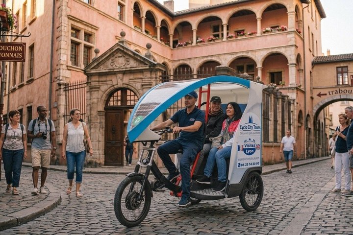 Electric pedicab riding through the traboules of Vieux Lyon