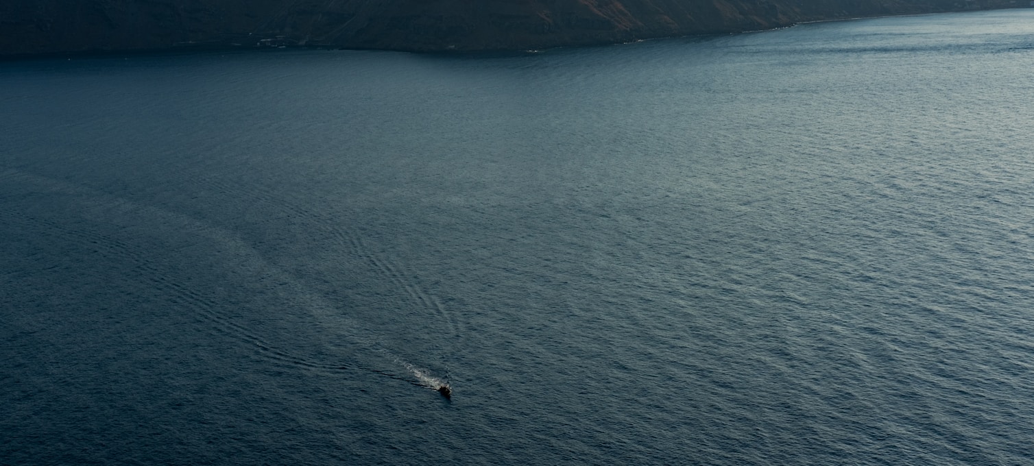 Cliffs of the Santorini caldera at sunset