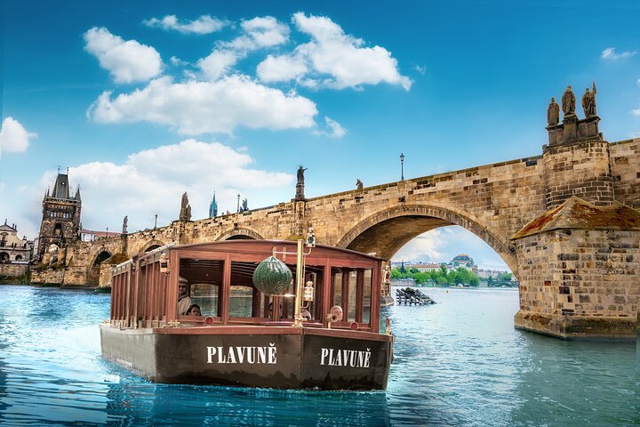 Vltava river cruise and guided walk through Malá Strana