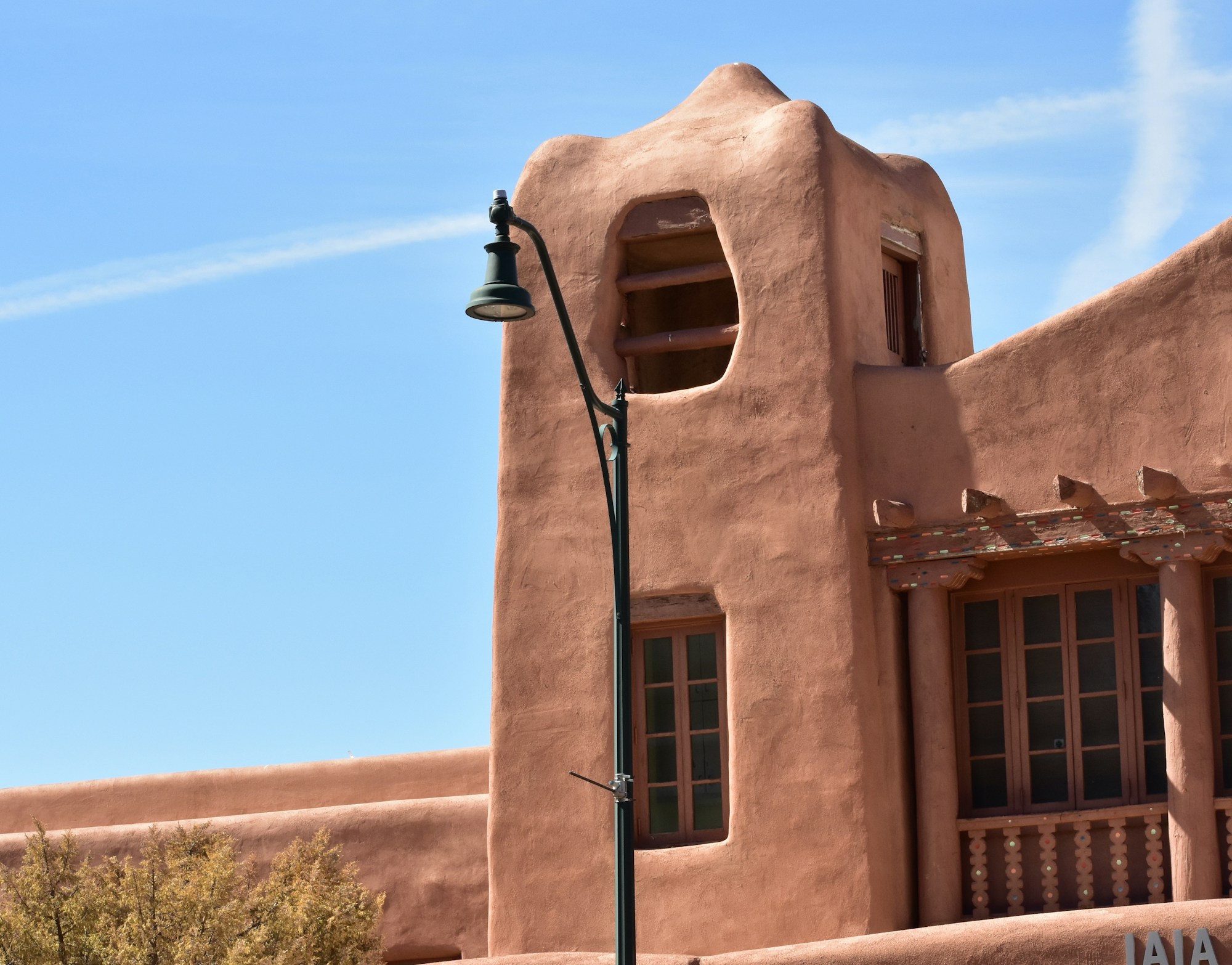 Typical New Mexico adobe architecture, ochre walls and exposed beams