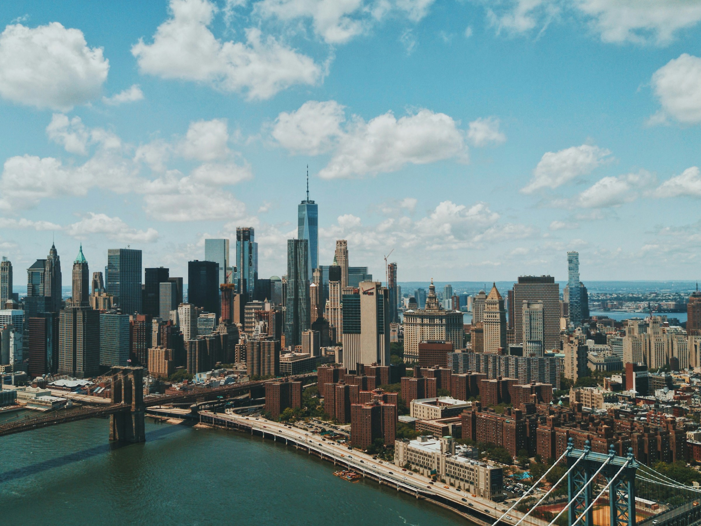 Manhattan skyline and Brooklyn Bridge over the East River in New York