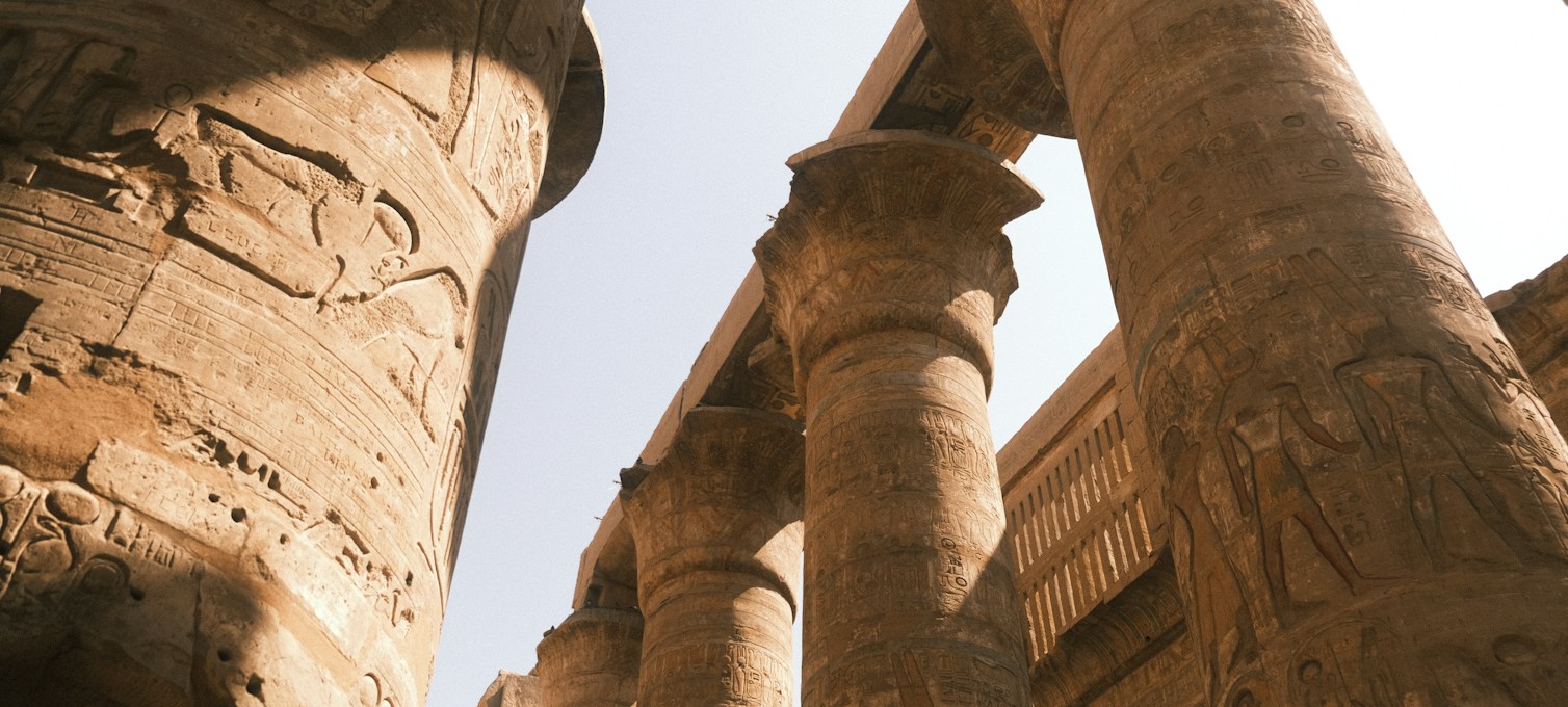 Columns of Karnak Temple in Luxor under a clear sky