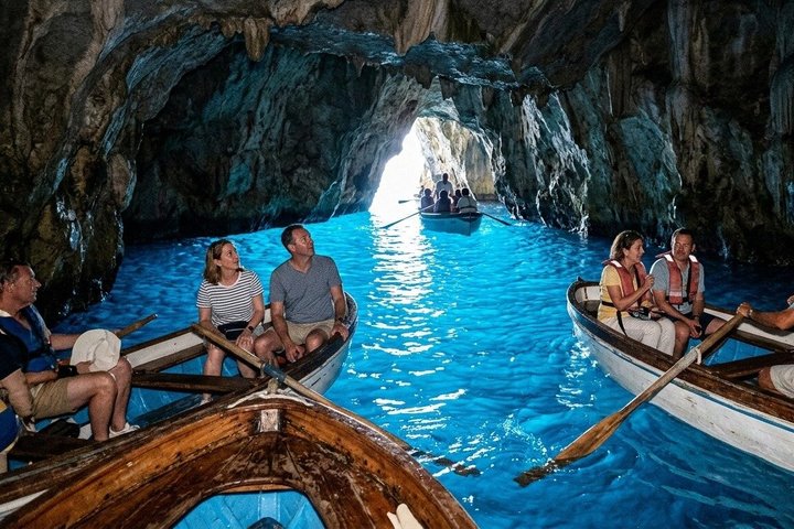 Boats in the Blue Grotto at Capri during an excursion from Naples