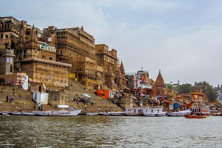 Private boat on the Ganges at dawn at the foot of the Varanasi ghats
