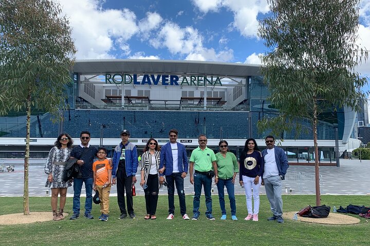 Players on a blue tennis court at Melbourne Park