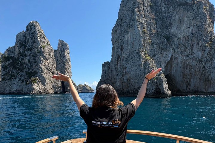 Swimming and relaxing in a small group during a Capri boat trip
