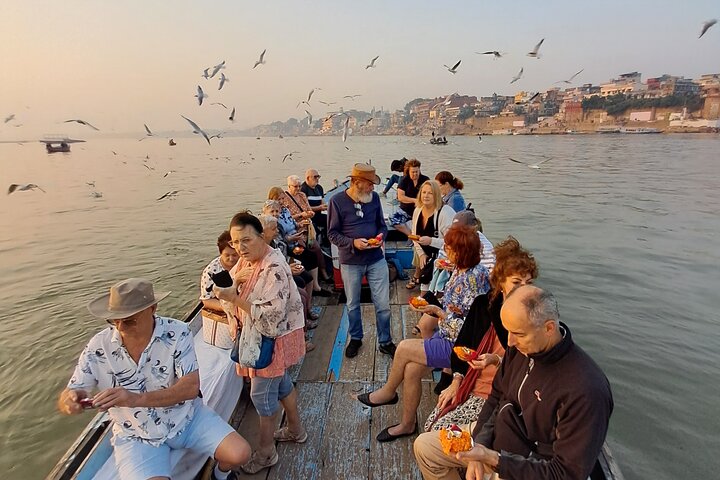 View of the Varanasi ghats from a rooftop at sunset