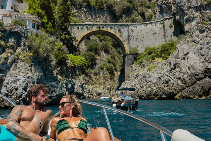 Boat sailing along the Amalfi Coast with a light lunch on board
