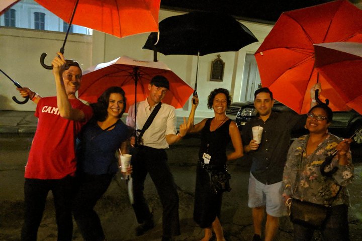 French Quarter alley lit up at nightfall during a ghost walk