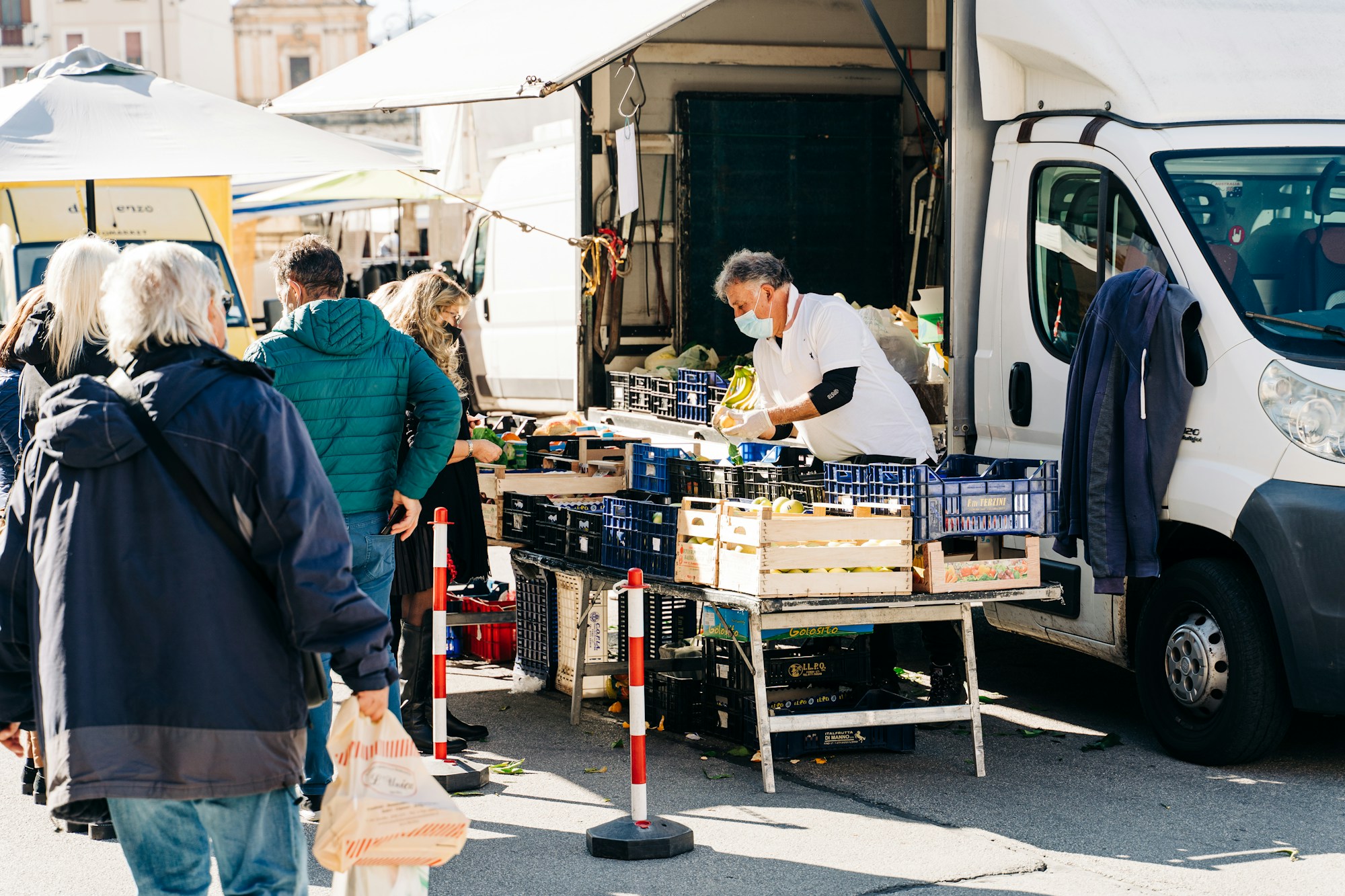 Stall selling local produce on a village square