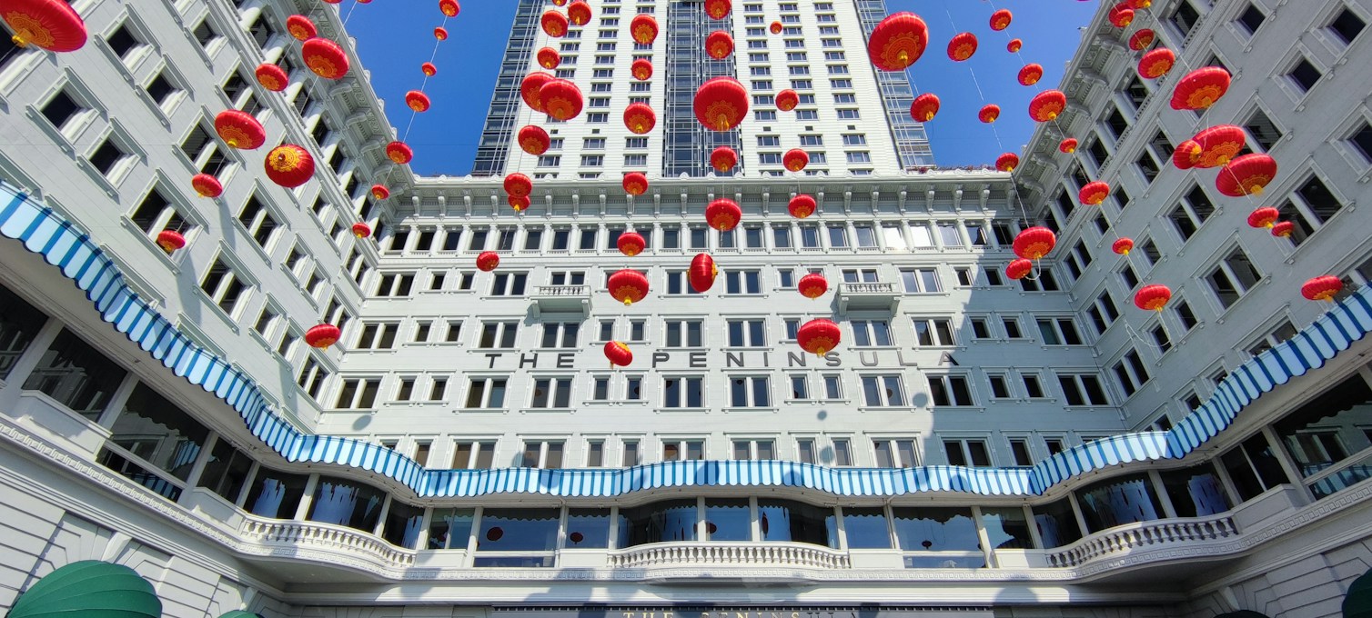 Red lanterns hanging over a street in Hong Kong