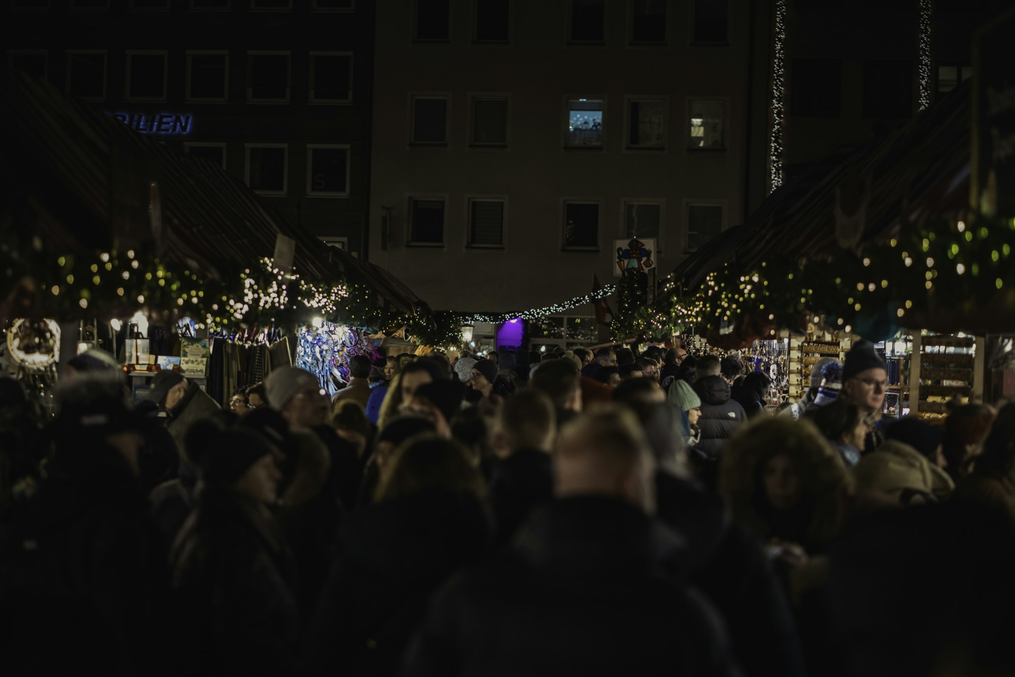 Nuremberg Christmas market lit up at nightfall