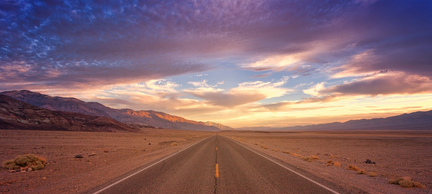 California desert road at sunset