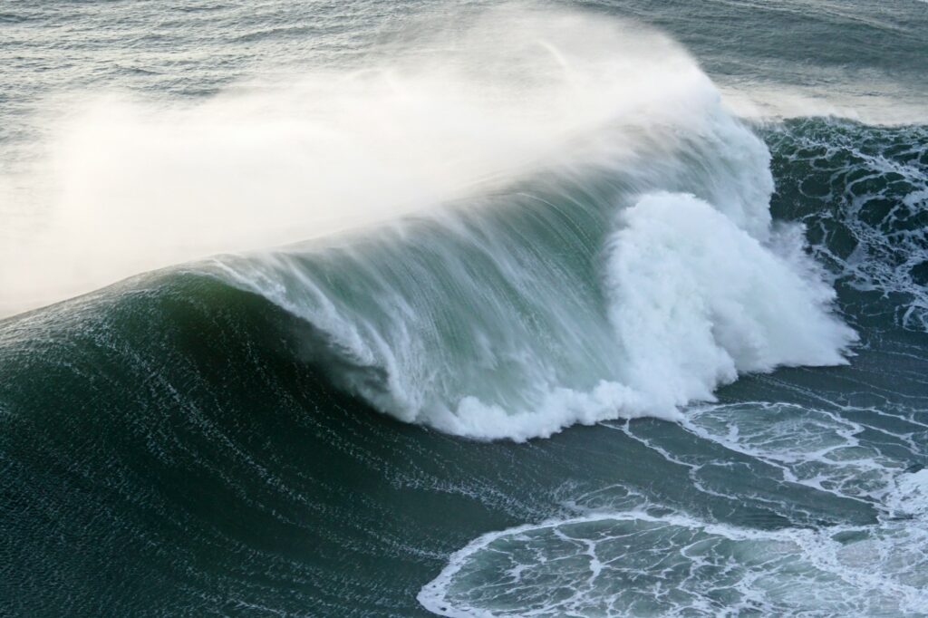 Waves crushing at Praia do Norte, Nazaré, Portugal
