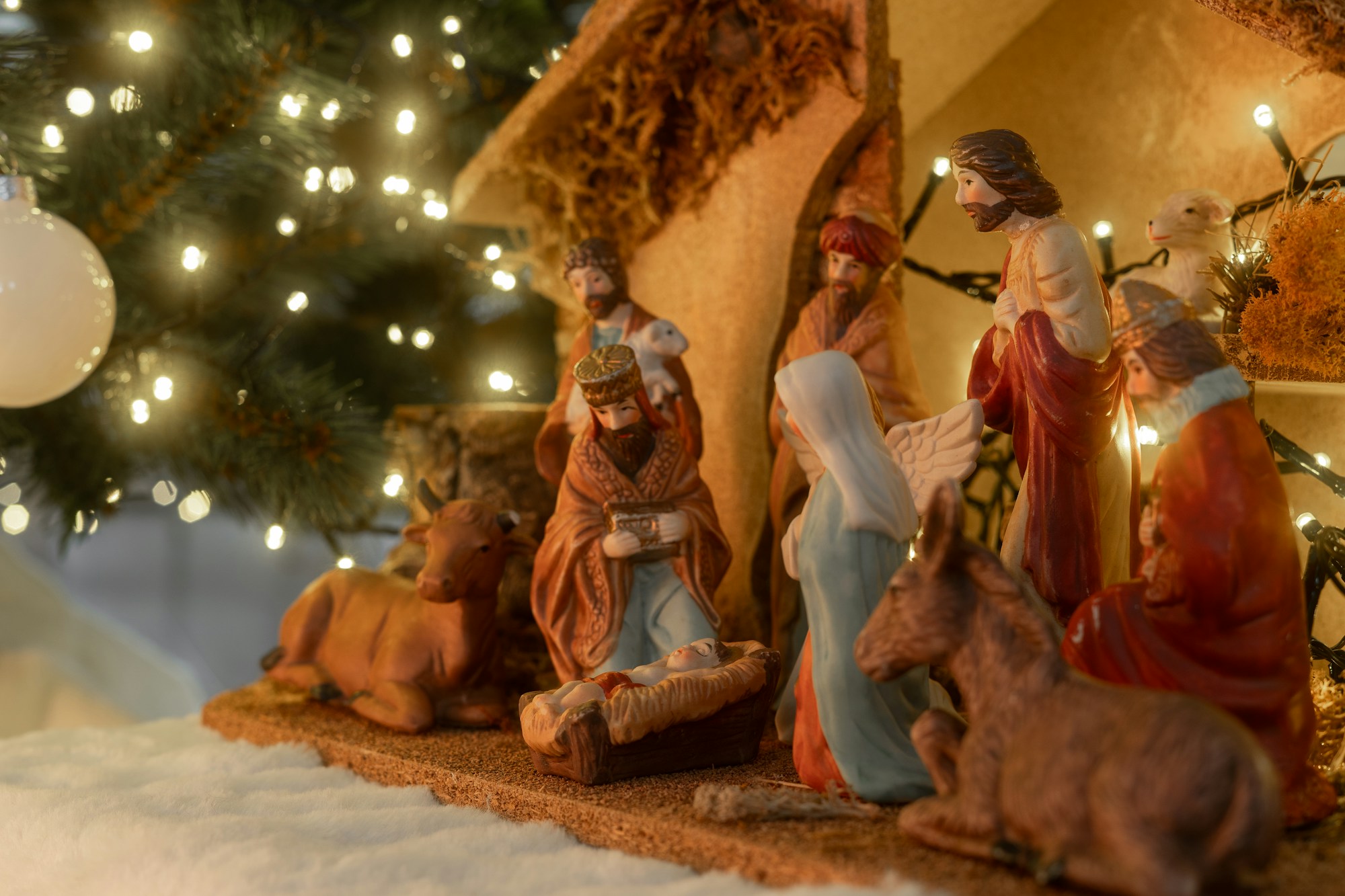 Christmas nativity scene with figurines and décor