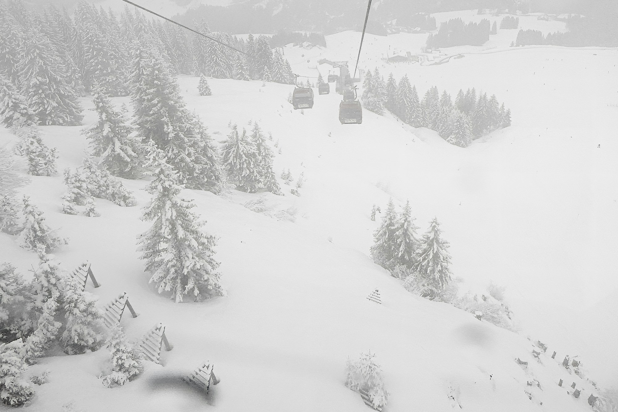 Cable car above the snowy slopes of the Austrian Alps