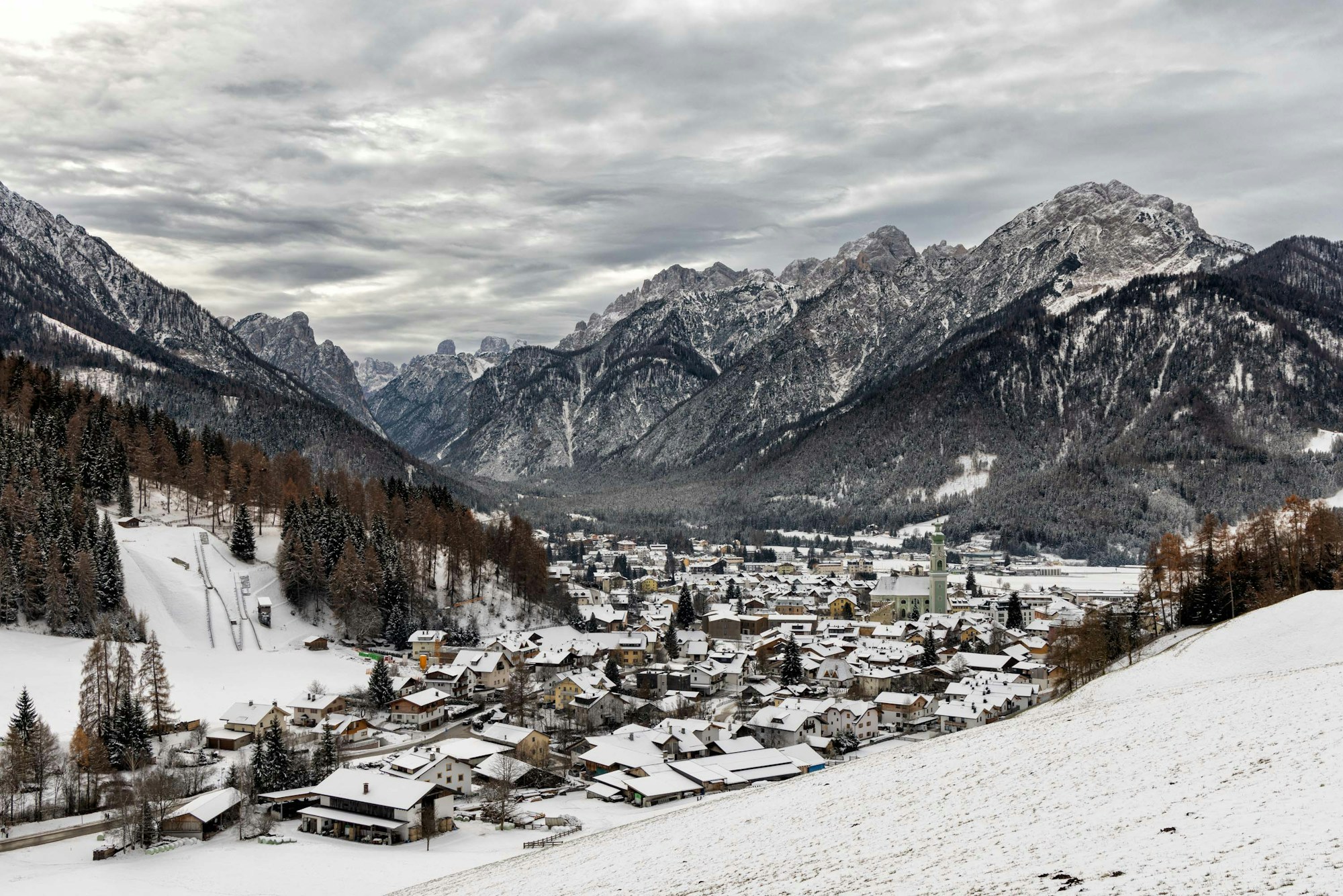 Snowy mountain village in the Dolomites