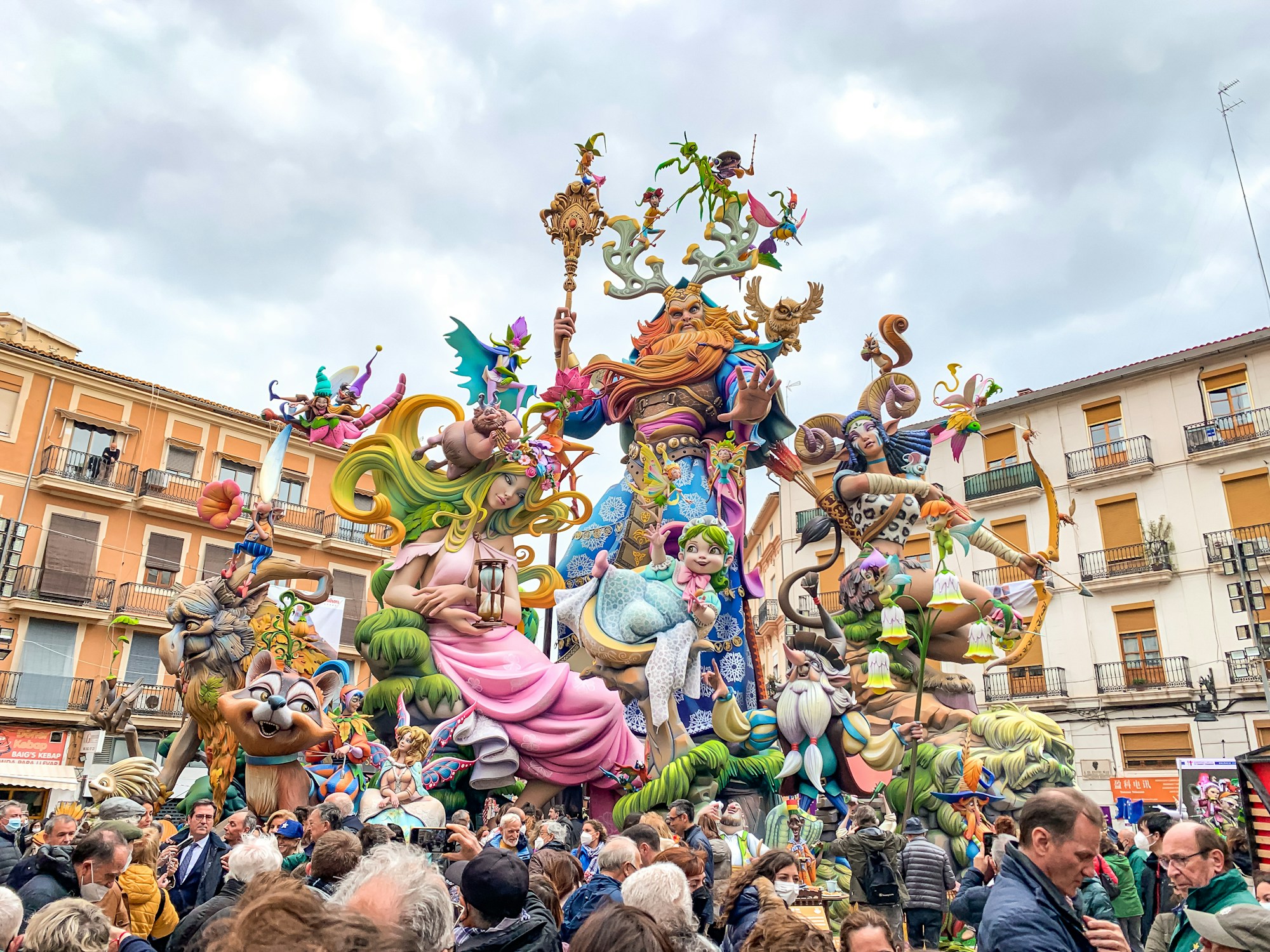 Fallas monument surrounded by spectators during Fallas week