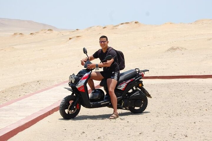 Scooter parked at the edge of the Paracas reserve