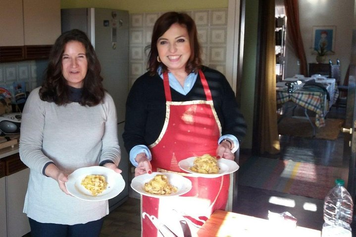 Fresh pasta spread out in a family kitchen