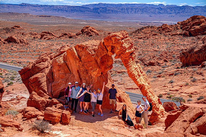 Tour group at Elephant Rock arch in Valley of Fire State Park near Las Vegas