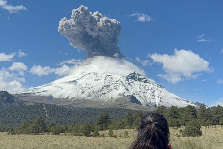 Volcano trekking day trip from Mexico City with trekking poles and lunch