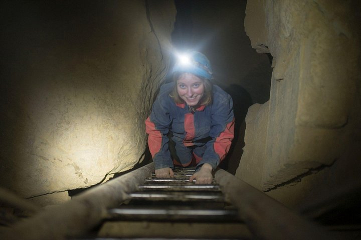 Underground gallery lit by a headlamp