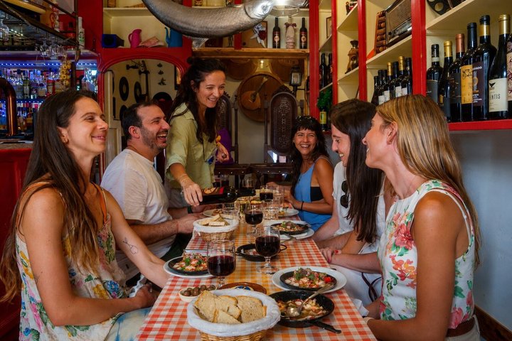 Food tour stop with local dishes on a Lisbon table