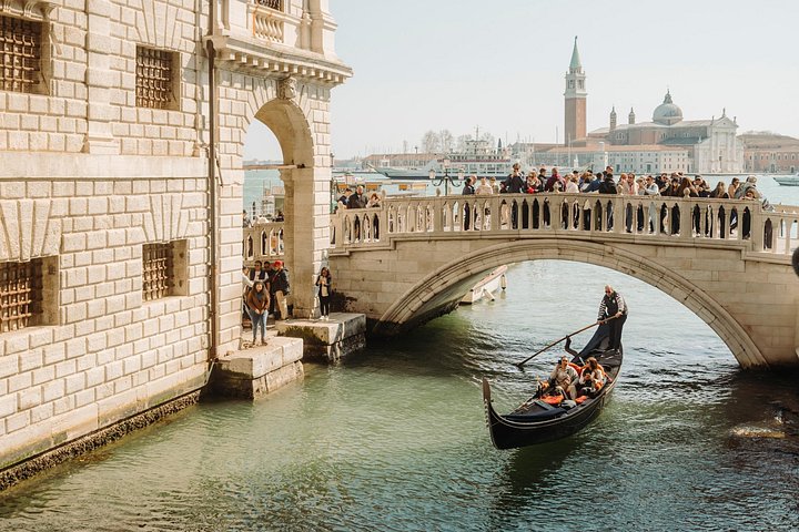Venice canal with a gondola, Viator product photo