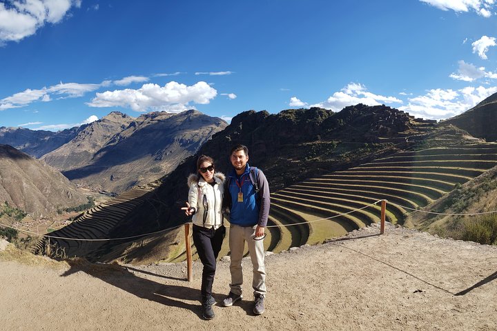 Private vehicle and Sacred Valley landscape with Pisac