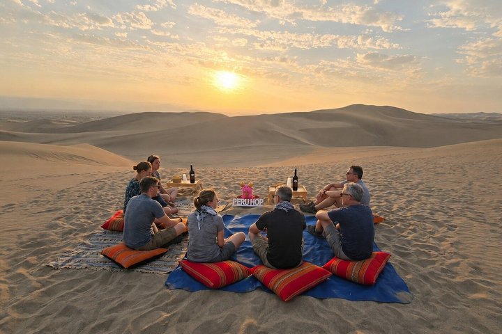 Group photo on a desert viewpoint near Huacachina