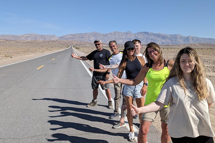 Small tour group on a desert road in Death Valley National Park