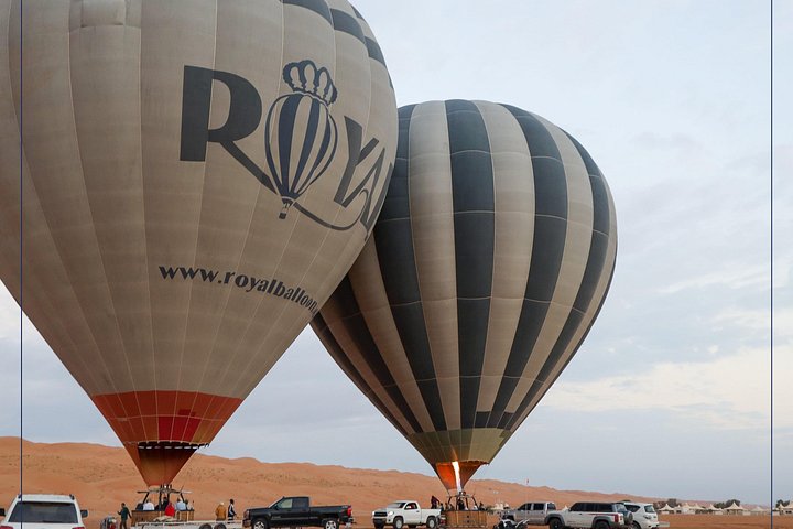 Hot air balloon flying over the Wahiba Sands dunes