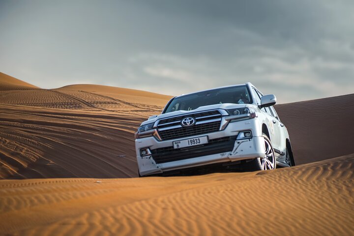 Dubai desert dunes at sunset