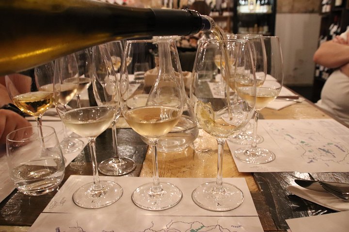 Glasses of Hungarian wine and a cheese board at a tasting in Budapest