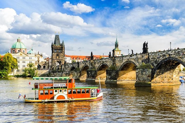 Private guide and visitors in a Prague lane